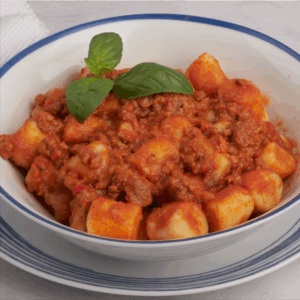 Ñoquis a la bolognesa
